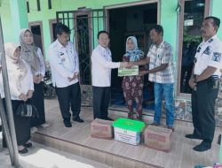 Pj Bupati Pringsewu Berikan Tali Asih untuk Korban Lakalantas dan Korban Tenggelam